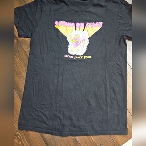 Sitting on Stacy concert shirt